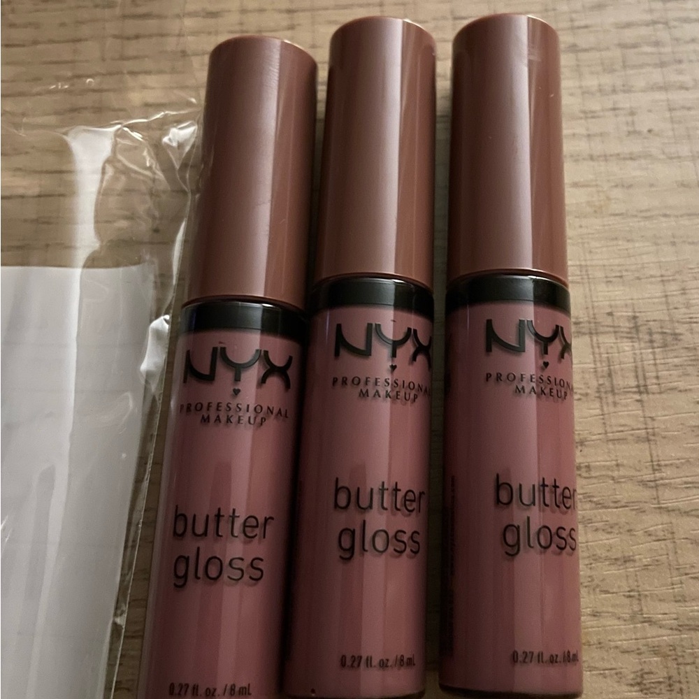 Brand new 3pk NYX butter lipgloss.  Color: Salty Coco.